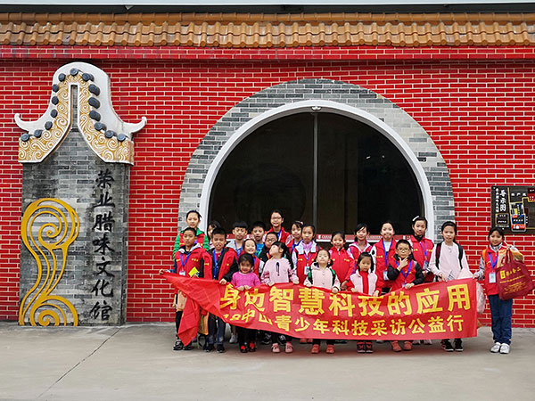 中山日報(bào)小記者到榮業(yè)臘味文化館體驗(yàn)老手藝，感悟舊時光